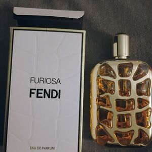 Fendi Gold Lattice Perfume Bottle with Amber Liquid